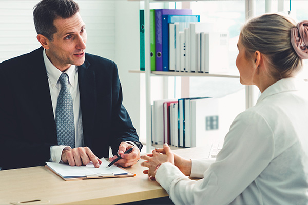 Job seeker in job interview meeting with manager and interviewer at corporate office. The young interviewee seeking for a professional career job opportunity . Human resources and recruitment concept.