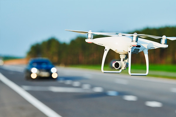 drone and transportation. drone with camera controls highway road conditions